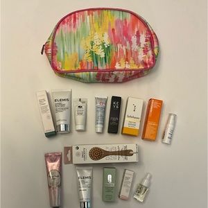 12 HIGH END SKIN CARE TRAVEL SIZE PLUS BAG/BRUSH